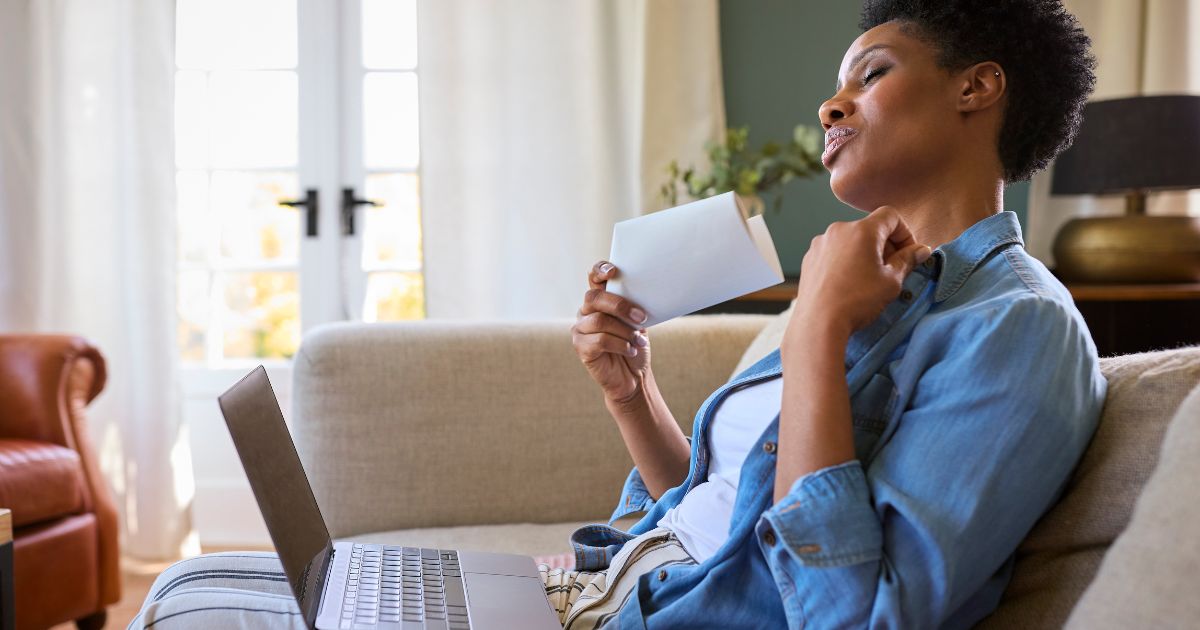 woman sweating in home